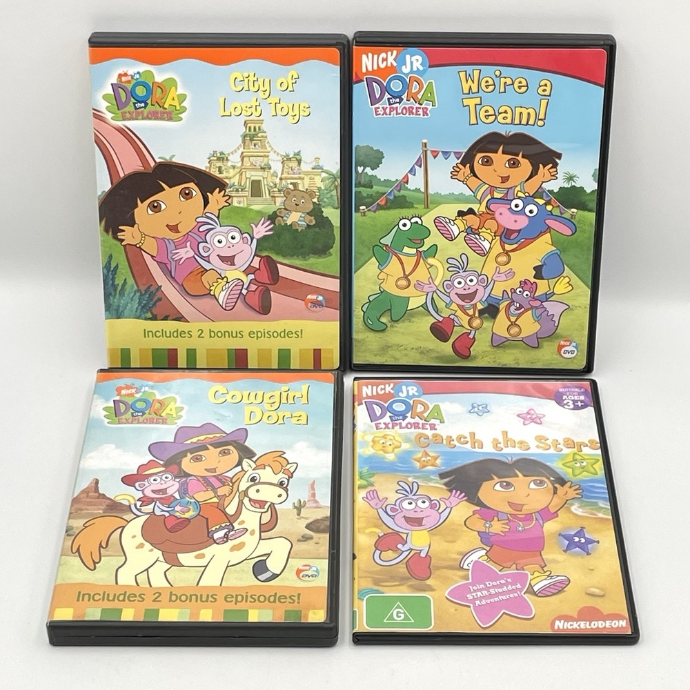 Vintage 2000s Dora The Explorer DVD Lot City Lost Toys Cowgirl Team Stars